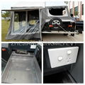 Off road travel trailer with slide tray  for stove and water sink