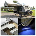 camp trailer with LED strips near the