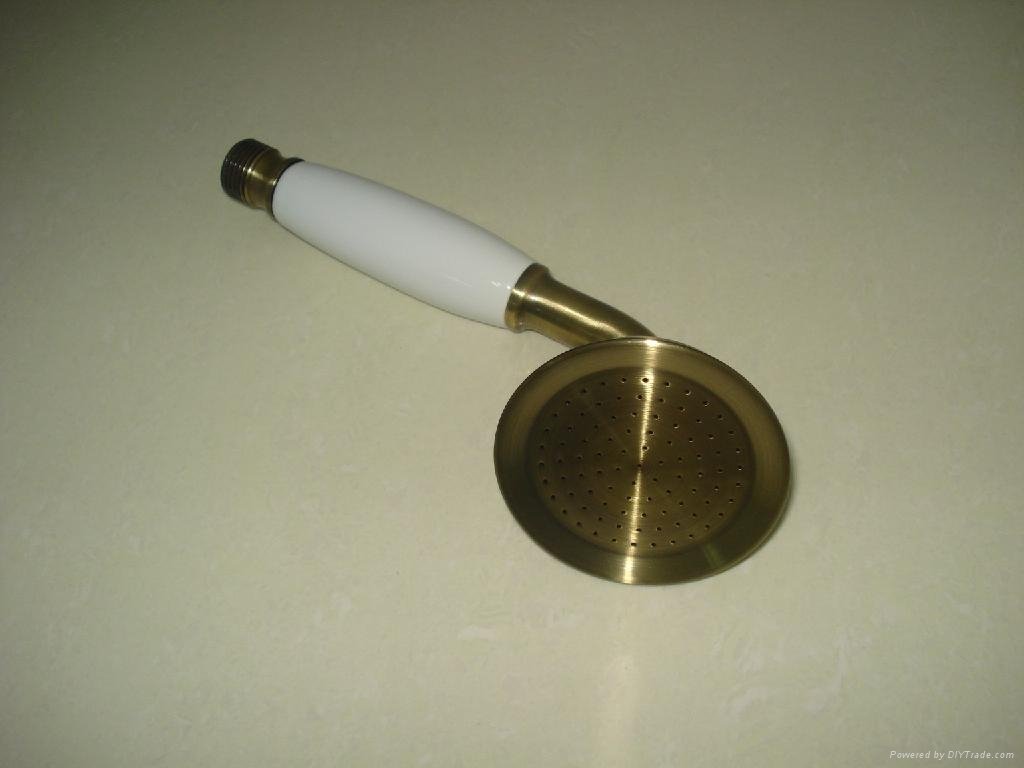 Phone-shape brass hand shower with ceramic handle 5