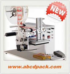 Semi automatic top labeling machine