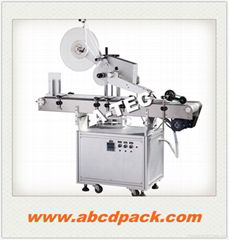 Automatic top labeling machine