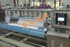 Automatic clean wiper slitting machine