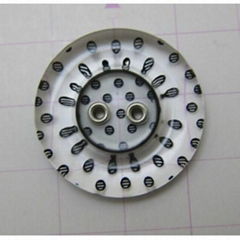 BUTTON WITH EYELETS