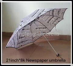 newspaper  3 folding umbrella 