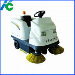 Ride-on floor sweeper