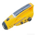 Solar/crank dynamo torch with FM/AM radio, AC dynamo