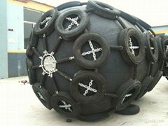 black rubber fender with tire and chain