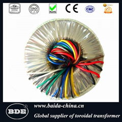 Toroidal electric power transformer