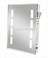 Illuminated bath mirror with four small rectangular light windows at each side