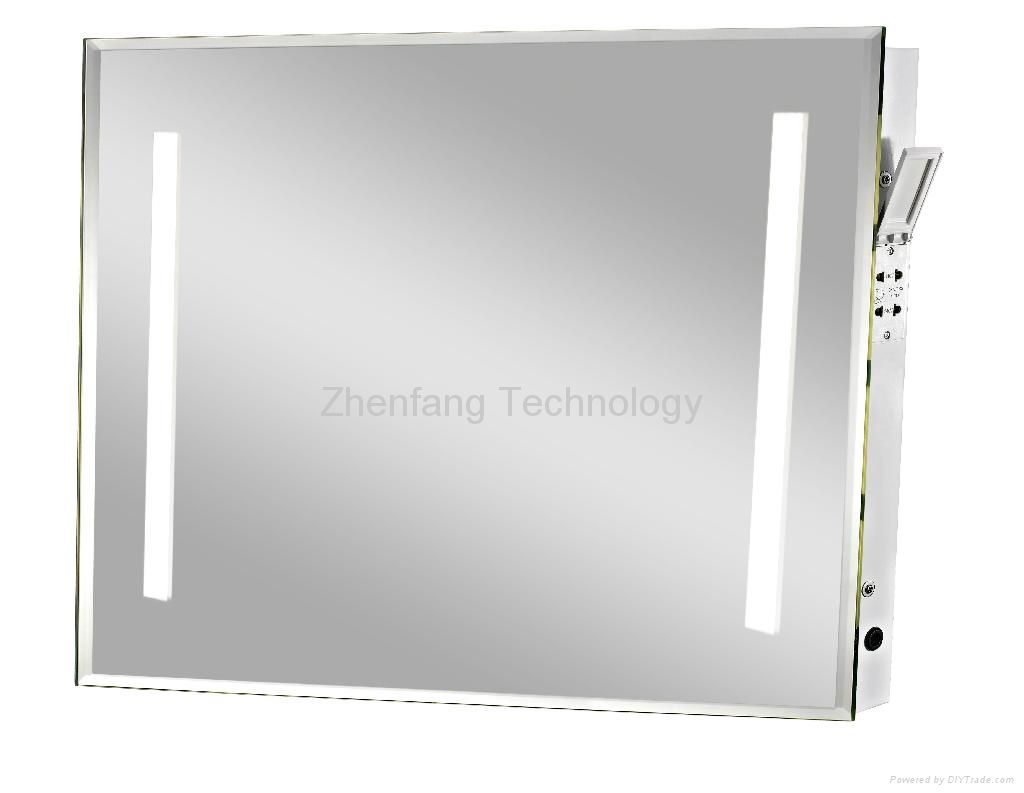 Backlit bath mirror with one rectangular light strip at each side