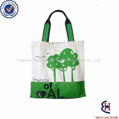 On green reusable shopping bags with logo