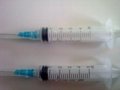 Disposable syringe and needle