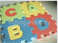 child using eva  alphabet puzzle mat 1