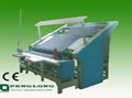 Tentionless fabric inspection machine 