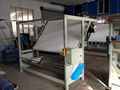 tensionless fabric plaiting machine