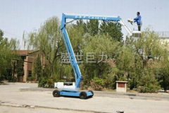 Folding boom lift platform