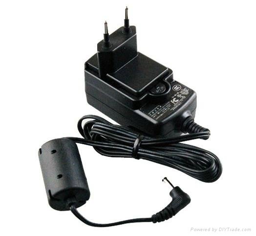 Euro wall type ac adapter 9v 1.3a