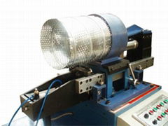 Spiral perforated duct machine