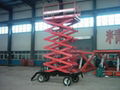 Hydraulic Four Wheel Mobile Scissor Lift Platform 1