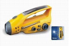 Solar dynamo torch with FM radio charger	