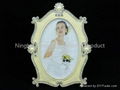 Oval white metal photo frame