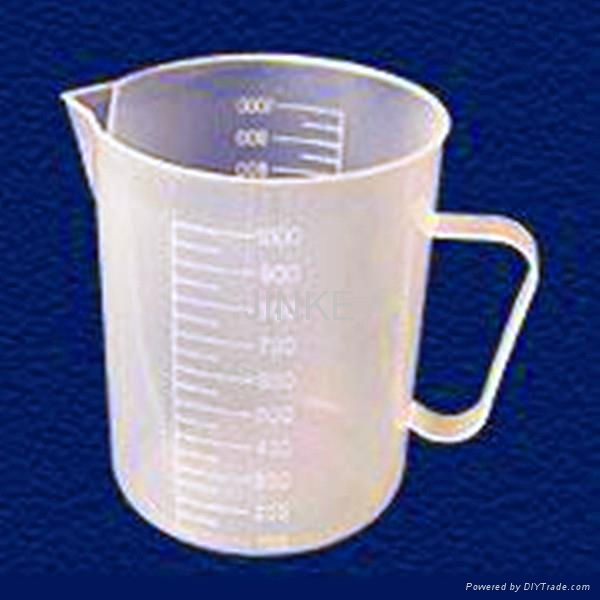 Measuring cup with scale injection mould