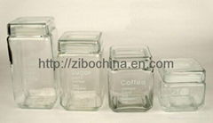 Clear square glass canister set with transparent lids