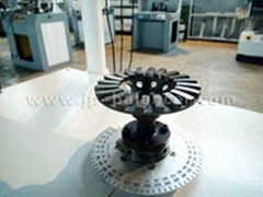 Grinding wheel dynamic balancing machine