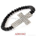 BRACELET STRETCH CRYSTAL STUDS PAVE SET  CRYSTAL BEAD CROSS METAL CAS 1