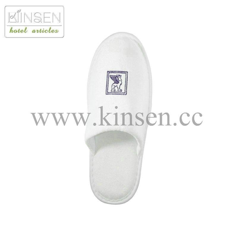 white hotel slipper with embroided logo