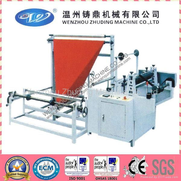 Edge folding and winding machine