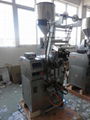 AUTOMATIC LIQUID PACKING MACHINE IN