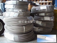 PTFE (Teflon) + stainless steel-braided