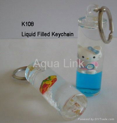 Liquid cylinder keychain, aqua cylinder keychain