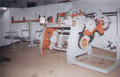 BARBED WIRE MAKING MACHINE