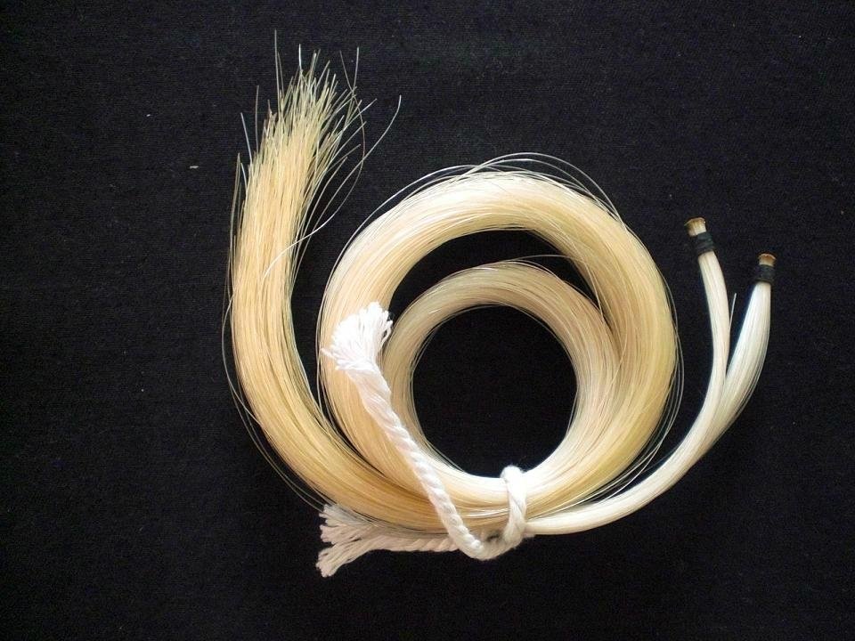 Unbleached white bow hair from stallion horse hair