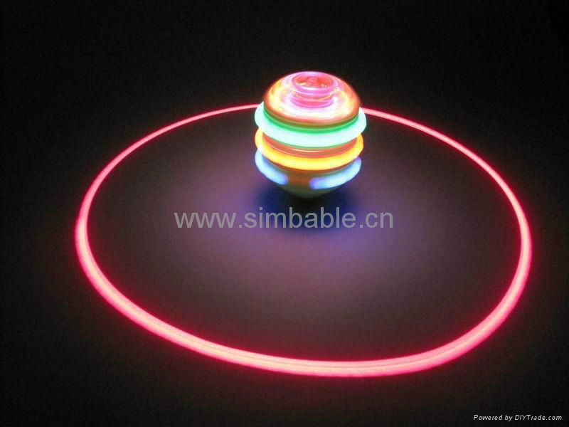 spinning top with music and light