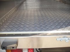 Truck body flooring