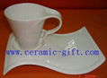 distorted ceramic cup & saucer with new