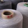 Top-dyed melange cotton/polyester yarn