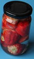 strawberry in glass jar 