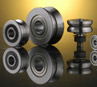 Track rollers with "V" groove profile -