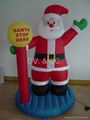 INFLATABLE SANTA WITH STOP HERE SIGN