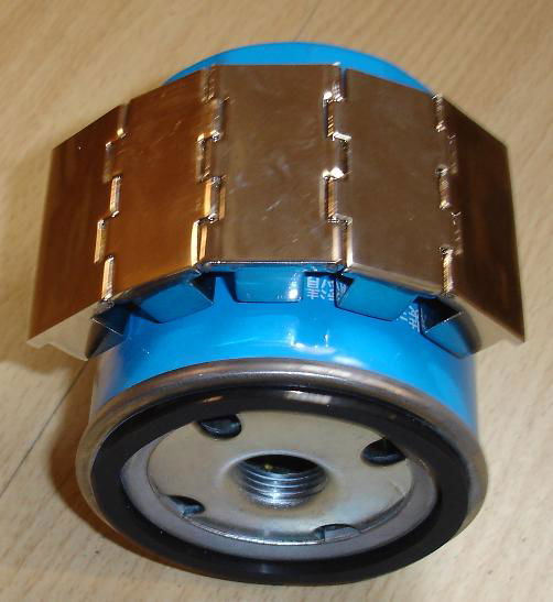 Engine Oil filter iron scrap absorption device
