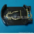 Button-type battery holder 1