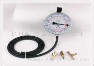 Vacuum pressure gauge