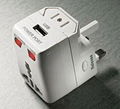 Universal travel adapter with USB 4