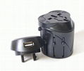 Universal travel adapter with USB 5