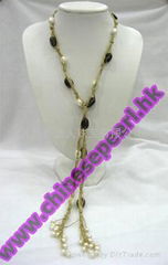 Freshwater pearl necklace with smoky quartz gold thread