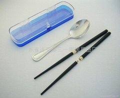 Stainless steel spoon and wood chopsticks